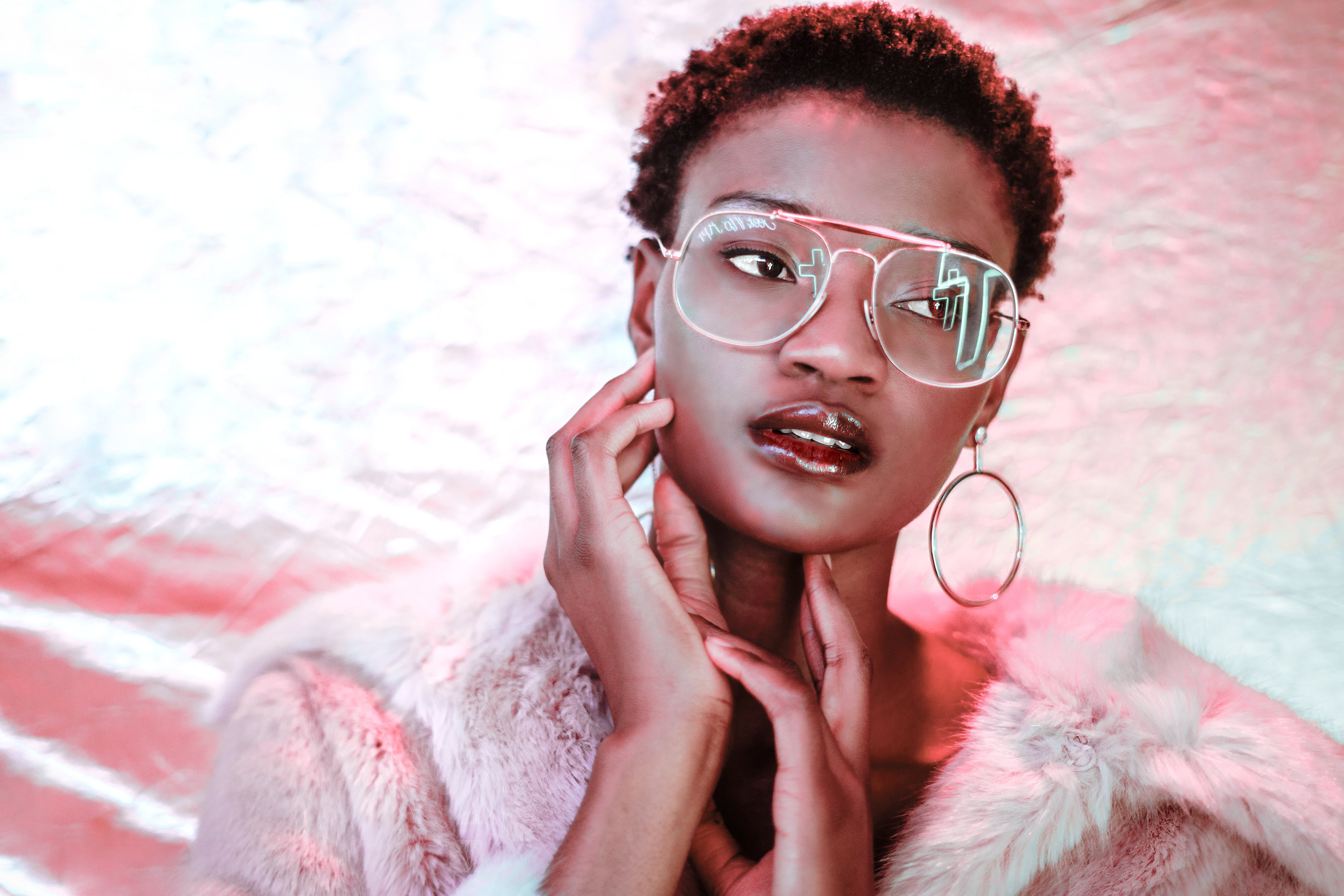 files/model-poses-with-neon-reflection.jpg